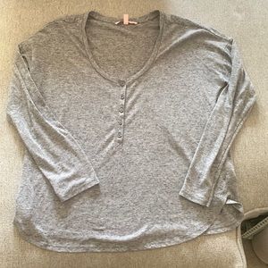 Grey Victoria’s Secret XS button down alley top has sheerness to fabric